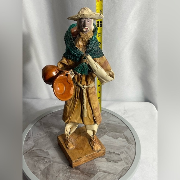 Handcrafted Artisan Figurine with Orange and Green Accents - Picture 13 of 14